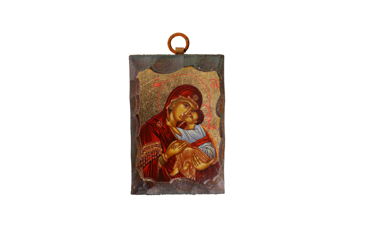 An icon of the Virgin Mary in a red robe holding the child Jesus, with both figures haloed against a gold leaf background. Above them are two angels, and the icon is bordered by a dark, textured frame with a metal loop at the top for hanging.