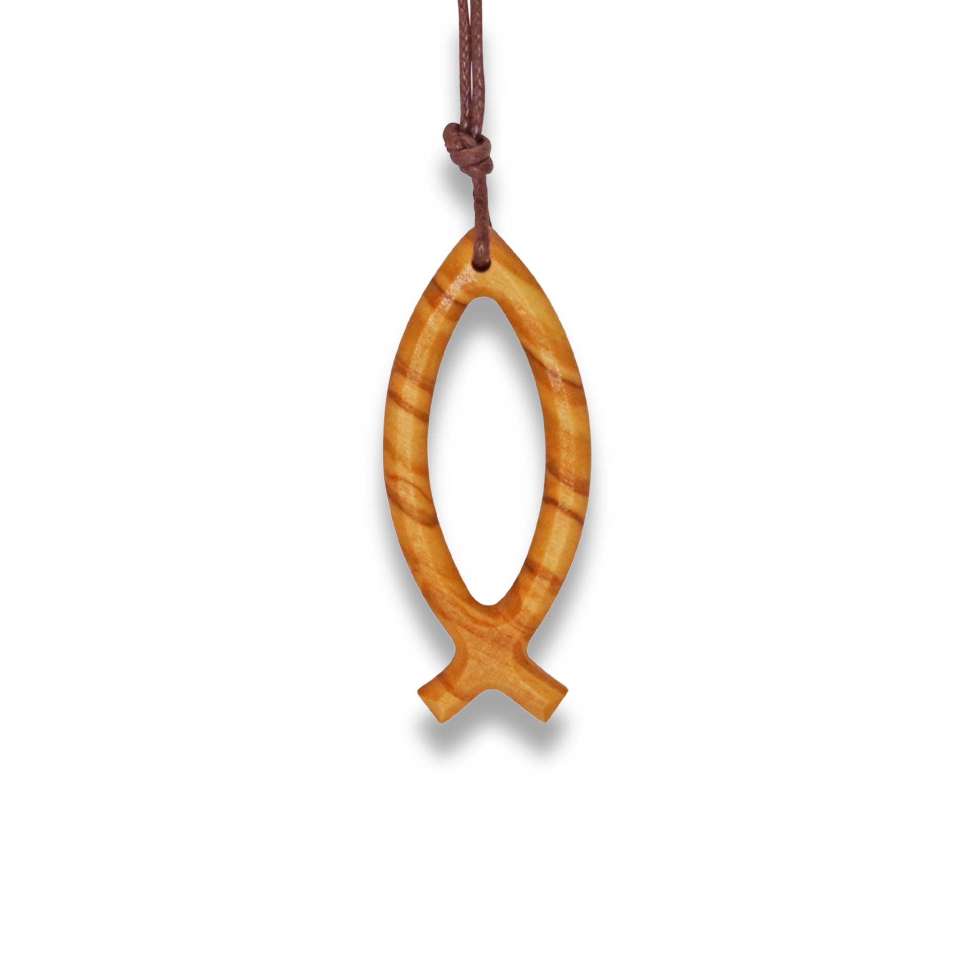 Wooden fish-shaped pendant on a white background