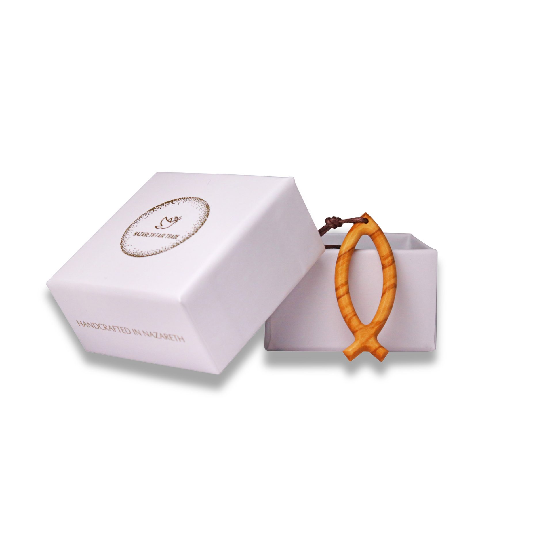 Wooden fish-shaped pendant in a white box on a white background