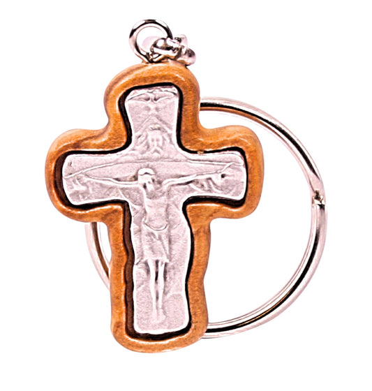 Olive wood wavy crucifix keychain with a detailed silver-toned metal depiction of Jesus, framed perfectly within the carved wooden cross, attached to a silver-toned chain.