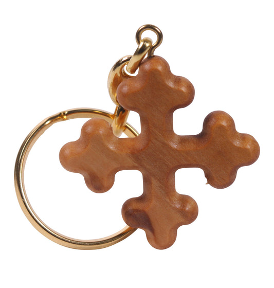 Orthodox-style olive wood cross keychain with three rounded protrusions on each end, attached to a metallic keyring.