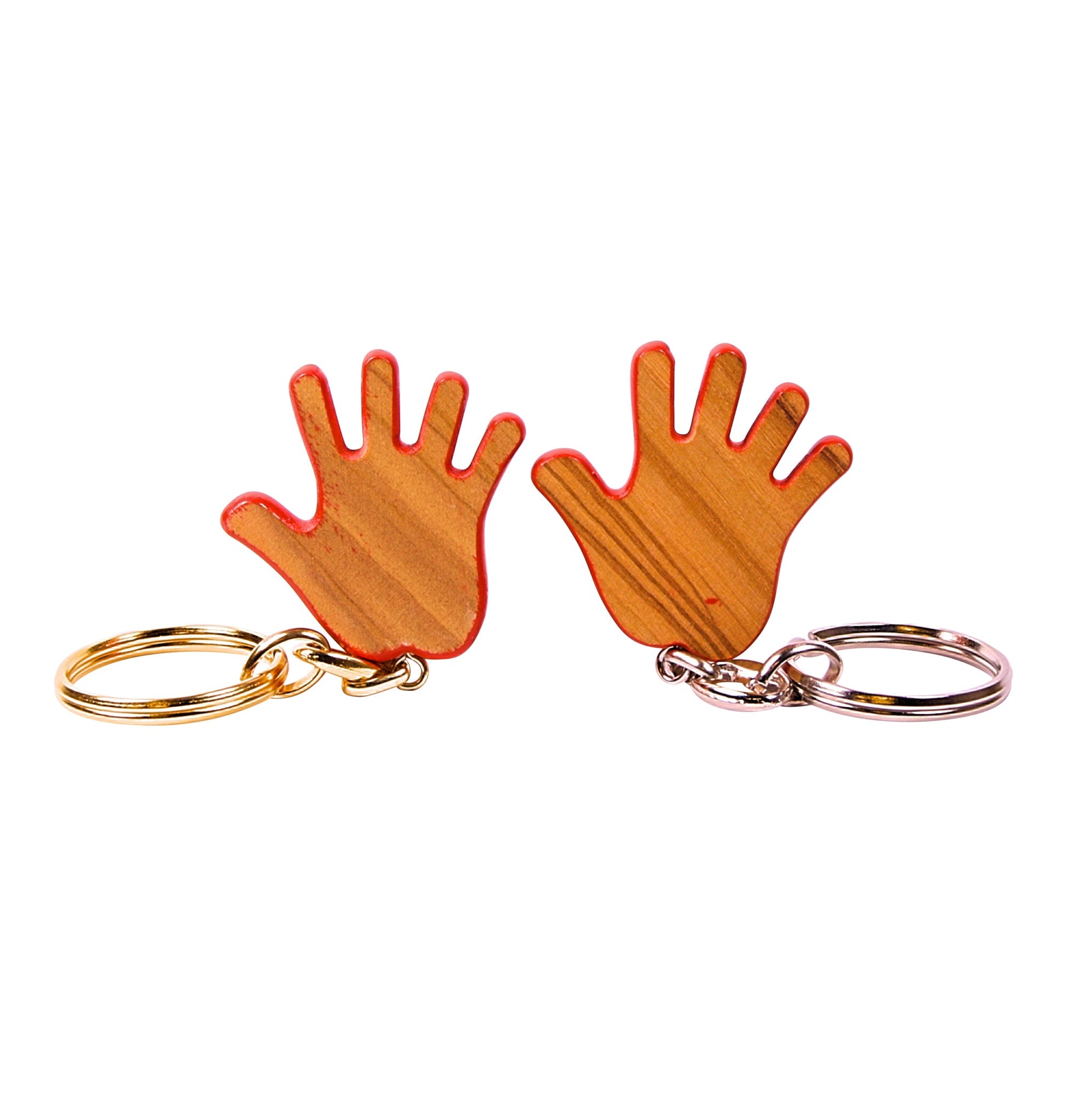 Two olive wood keychain pendants shaped like open hands with red-painted edges, one attached to a gold-toned metal ring and the other to a silver-toned metal ring.