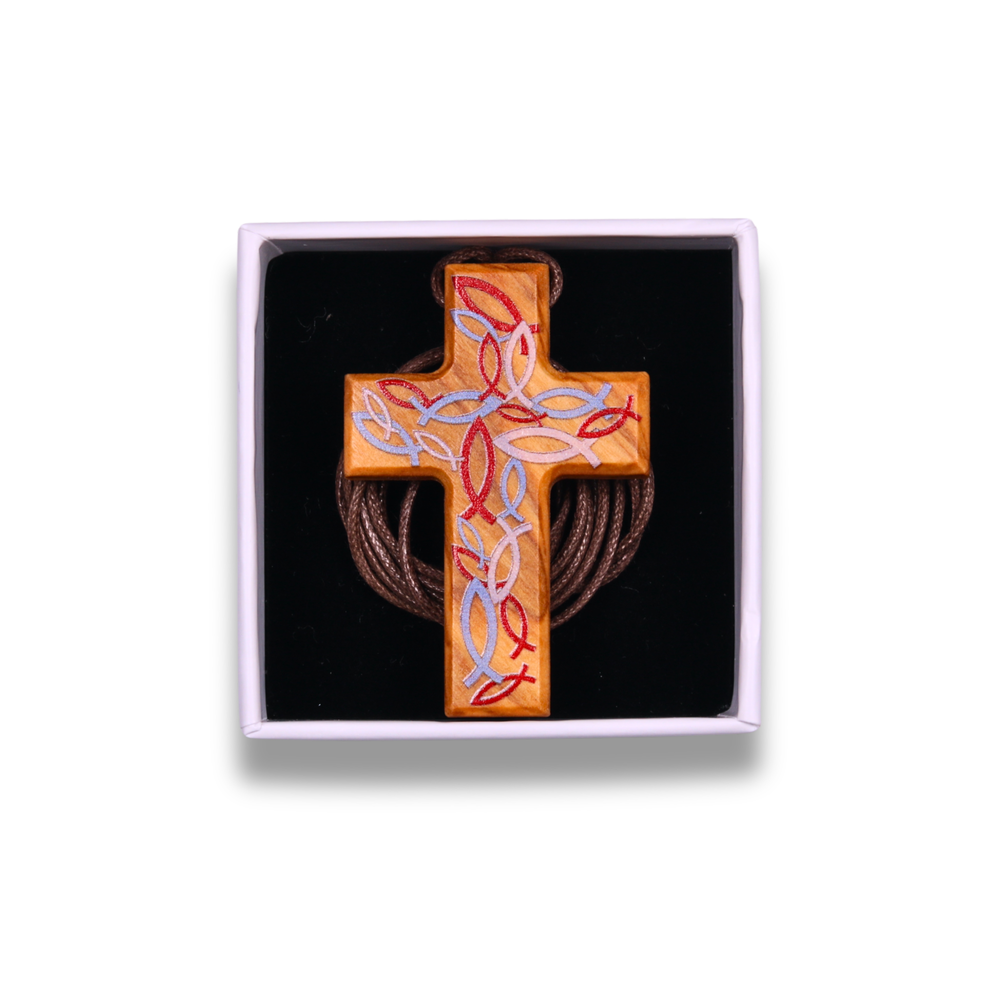 Handcrafted olive wood cross necklace featuring intricate red and light blue Ichthus fish engravings forming a woven pattern on the surface, suspended on a brown cord. In a gift box.