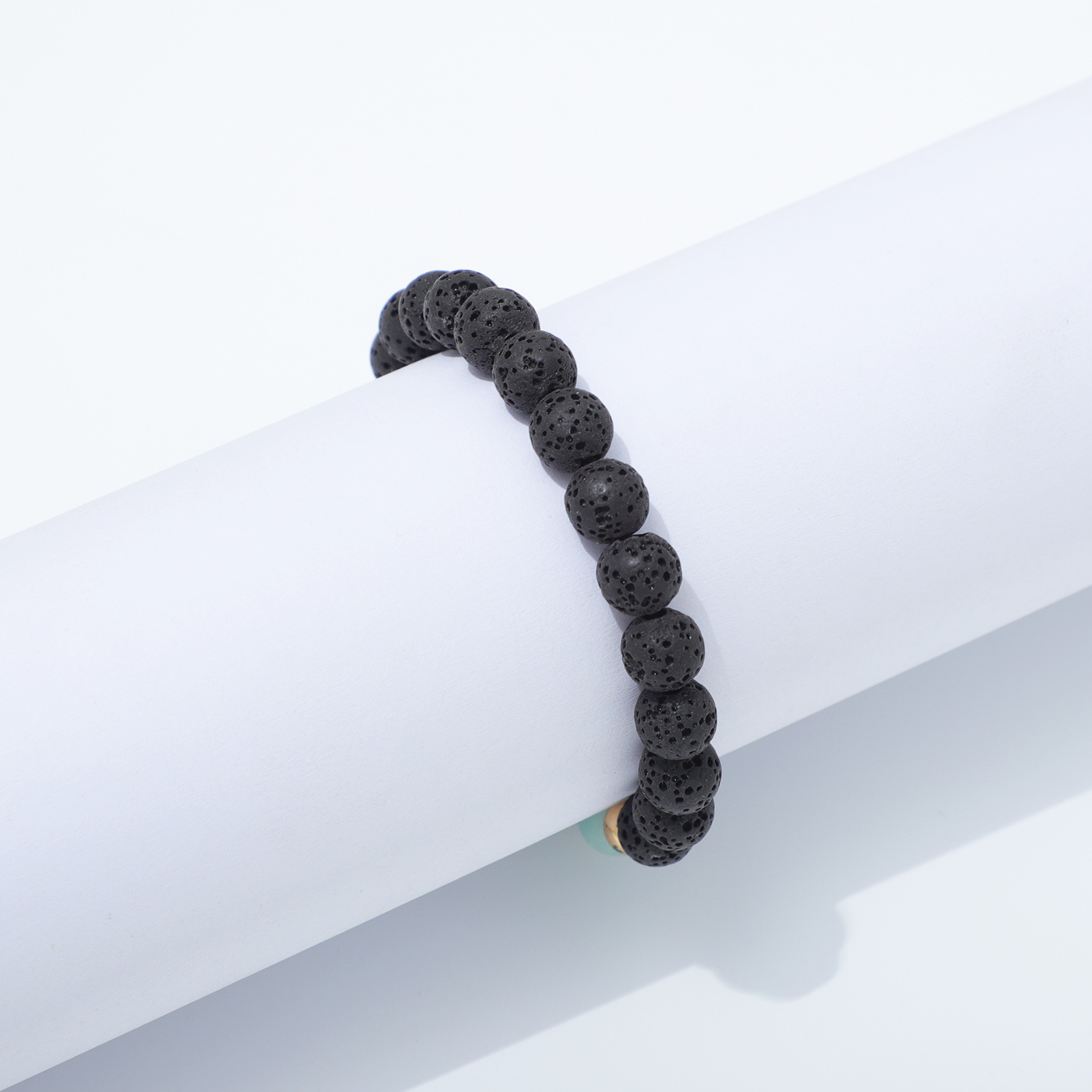 Lava Stone & Moonstone Bracelet on White Display Tube