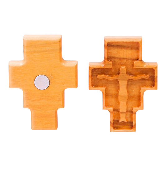 Olive wood cross magnet shown from the front and back. The front features a detailed carving of the San Damiano cross, while the back has a circular magnet embedded in the center. The images display a single magnet from both sides to highlight the craftsmanship and the magnet feature, not as a pair of items.