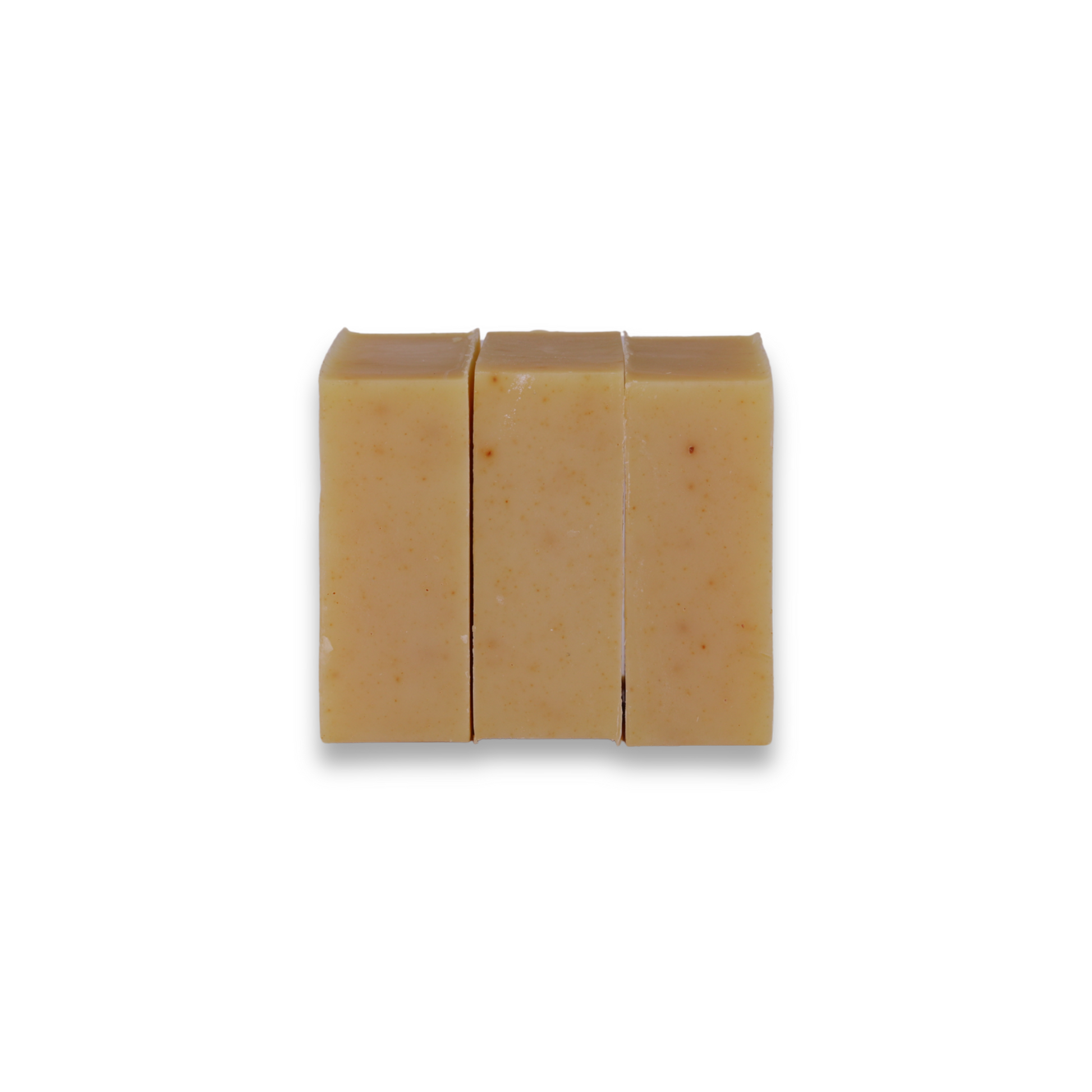 Three bars of soap stacked on a white background