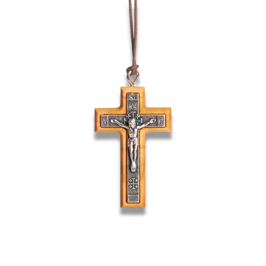 Crucifix necklace on a white background