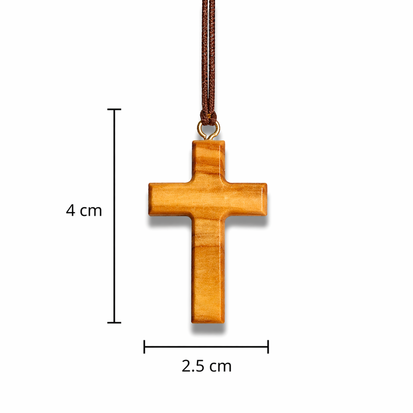 A wooden cross pendant, measuring 4 cm in height and 2.5 cm wide, hangs from a brown cord. The cross is crafted from light-toned wood with a visible grain, and a gold-coloured metal loop attaches it to the cord.