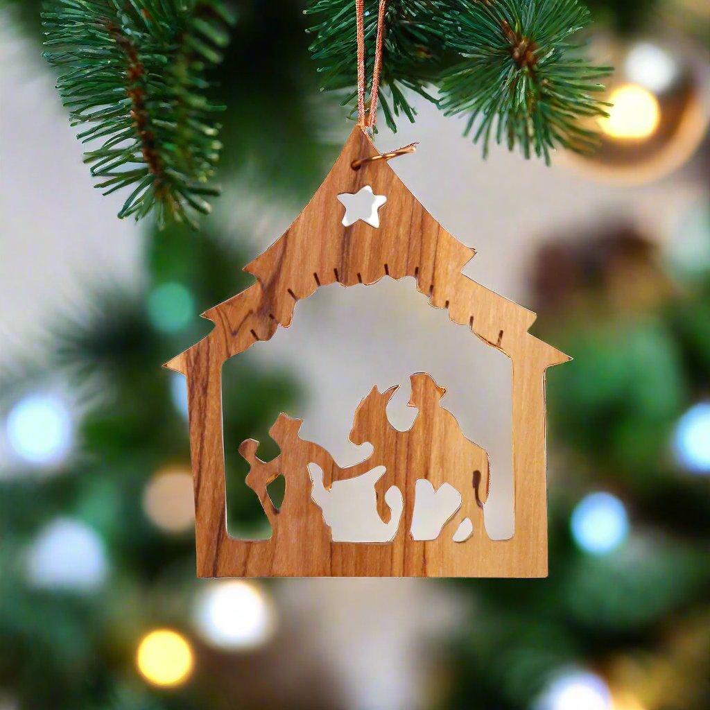 Nativity Ornament Set from Bethlehem Hanging On Christmas Tree