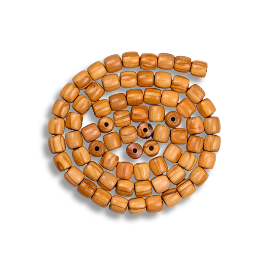 String of wooden beads on a white background