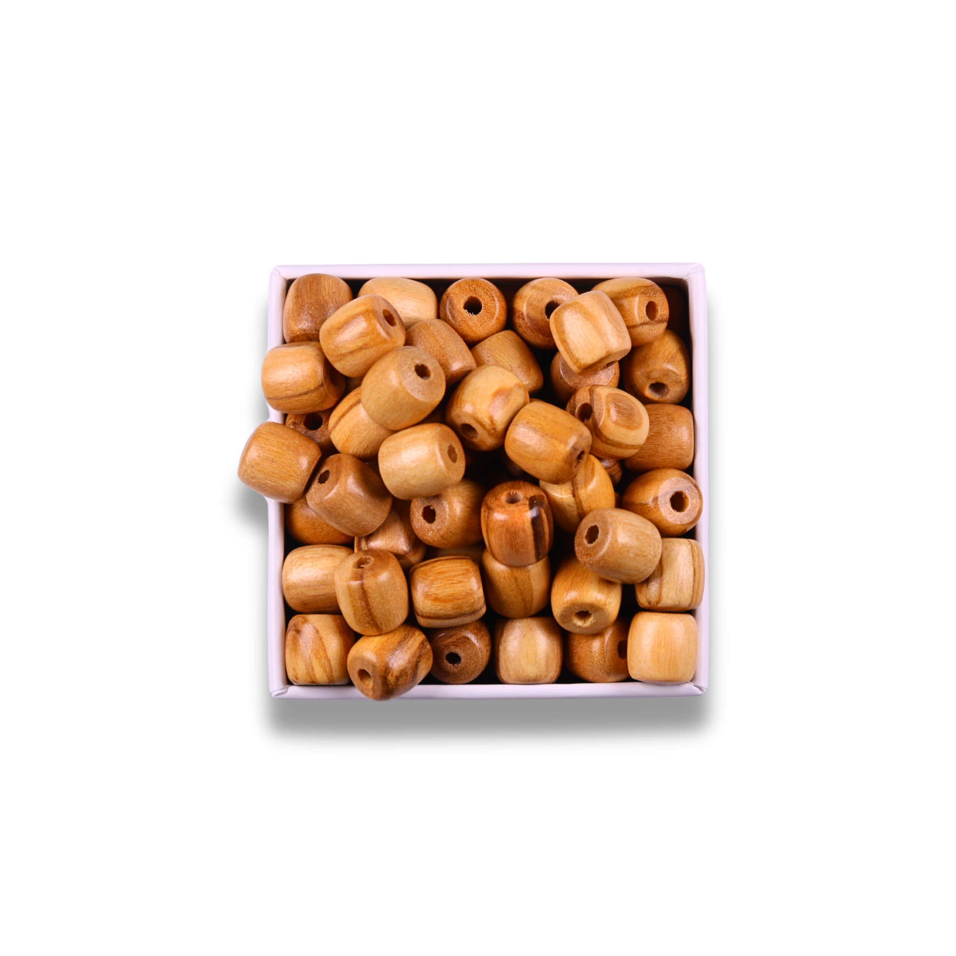 Box of wooden beads on a white background