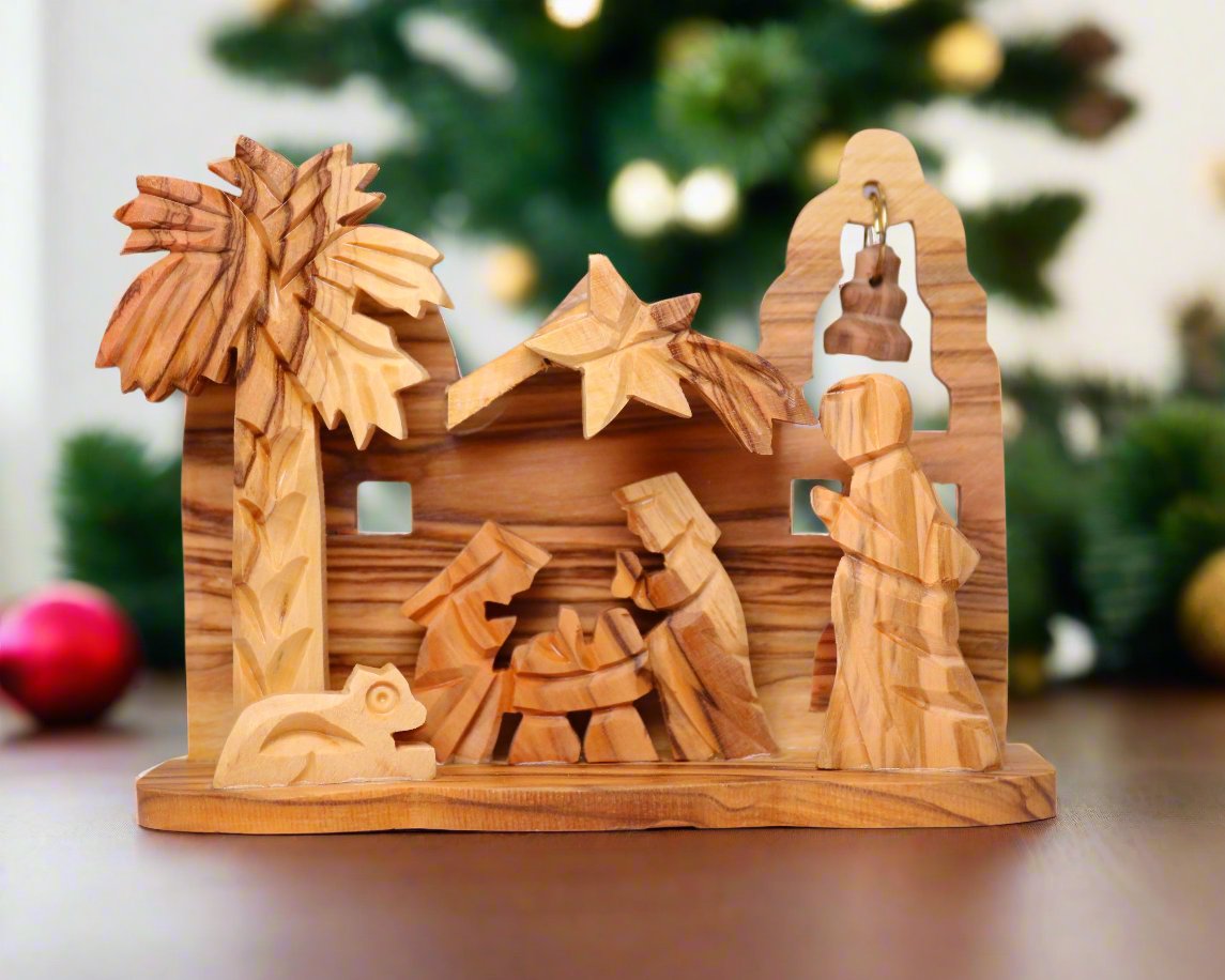 Olive Wood Nativity Crib Set Under a Christmas Tree