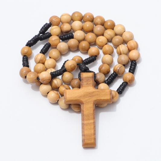 Wooden rosary on a white background