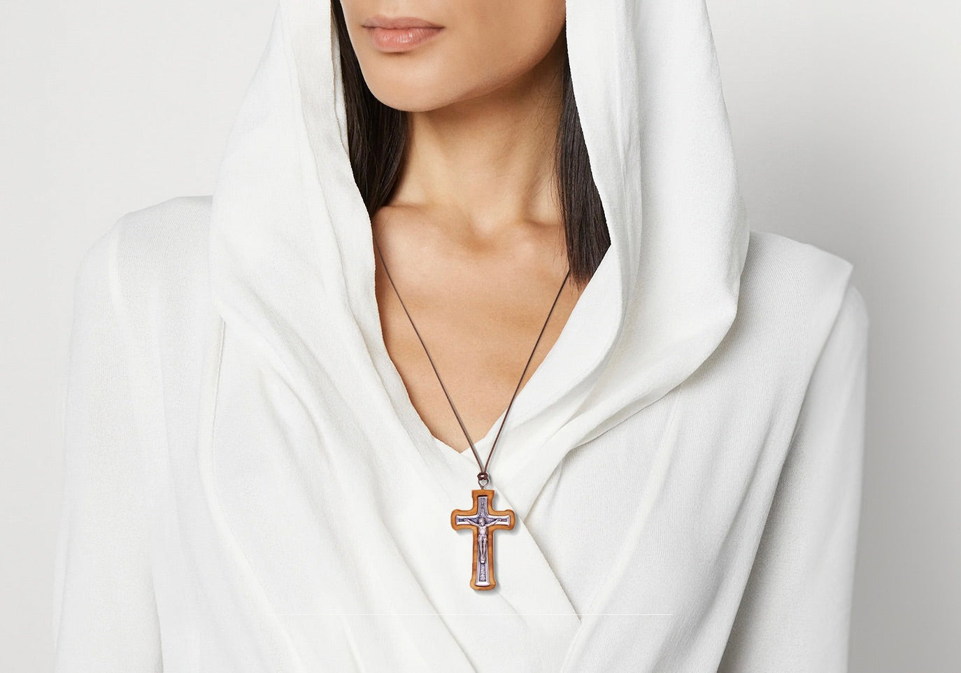 Radiant Corners Metal Crucifix in Olive Wood Frame Necklace On Woman