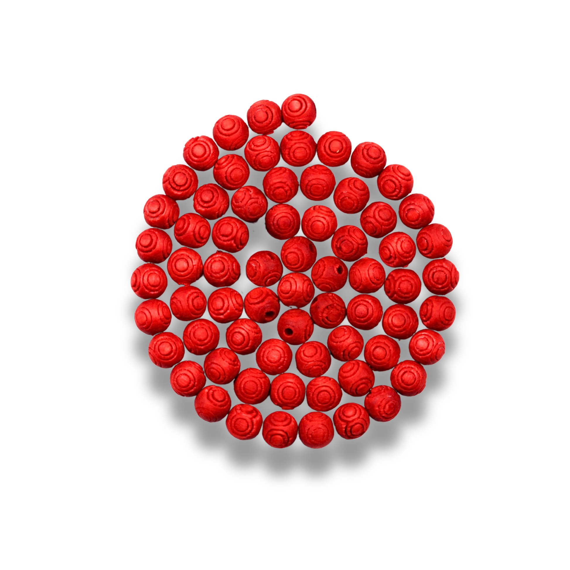 Red rose-shaped beads arranged in a circular pattern on a white background