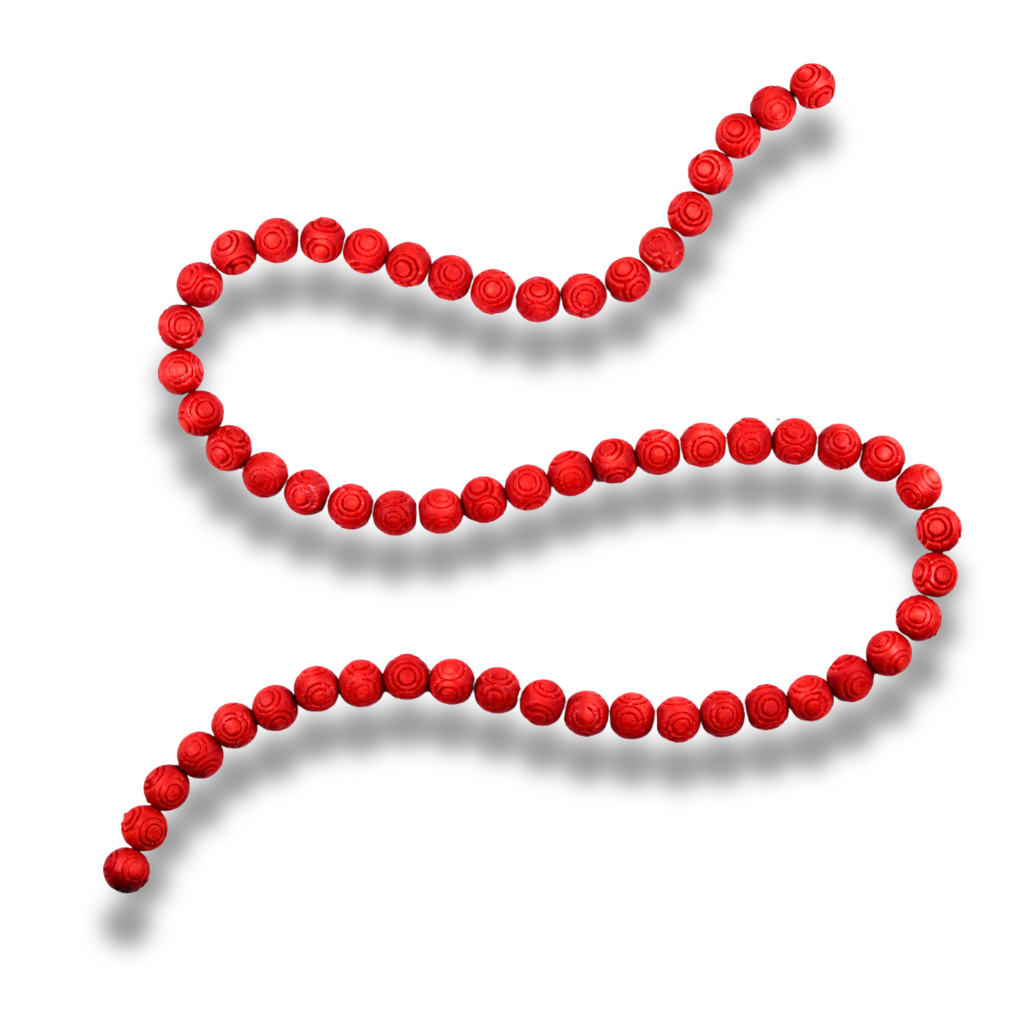 Red beaded necklace on a white background