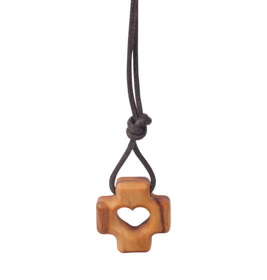 Olive wood cross pendant with a heart-shaped cutout in the center, suspended from a soft cotton cord.
