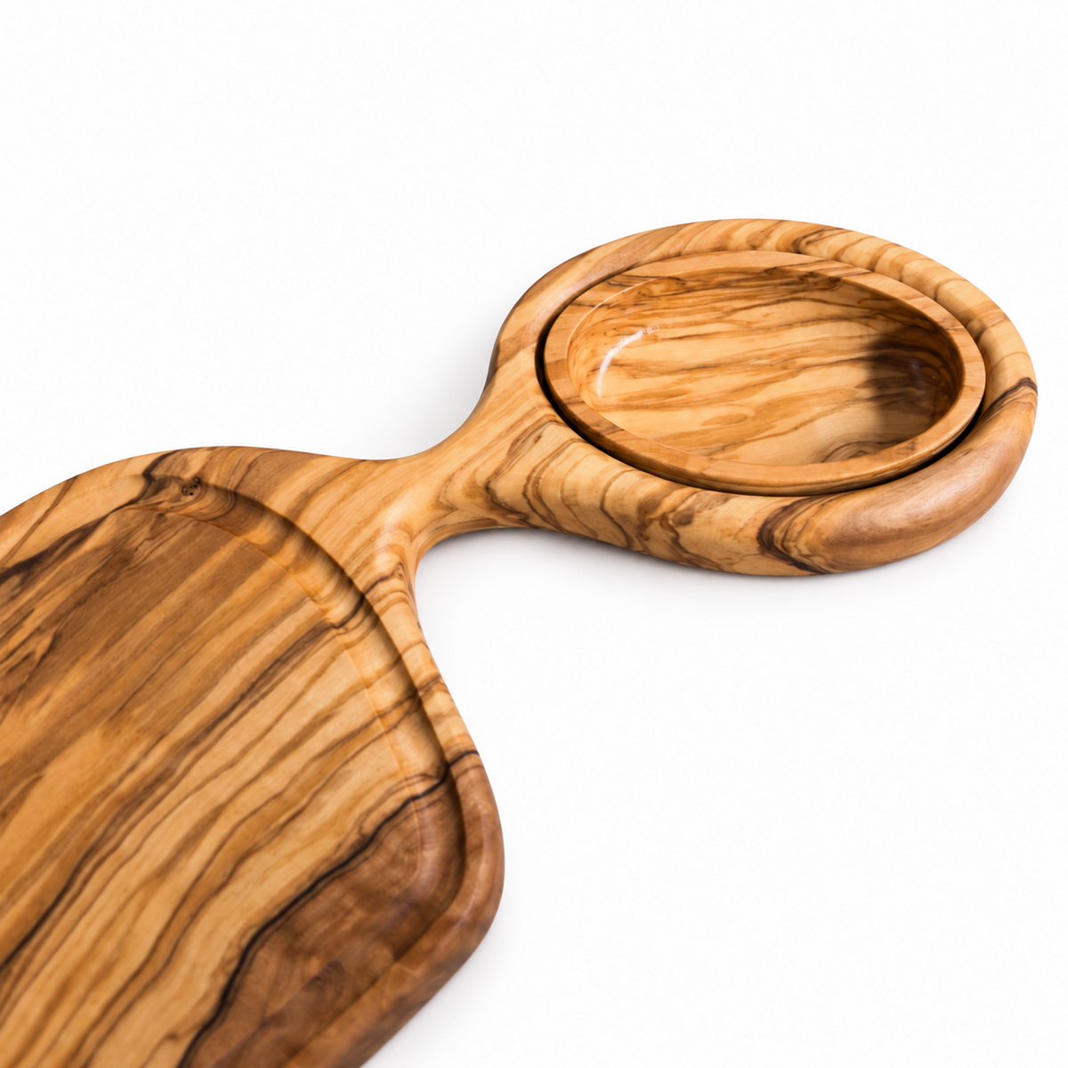 Close-up of the removable oval plate seated in the olive wood serving tray