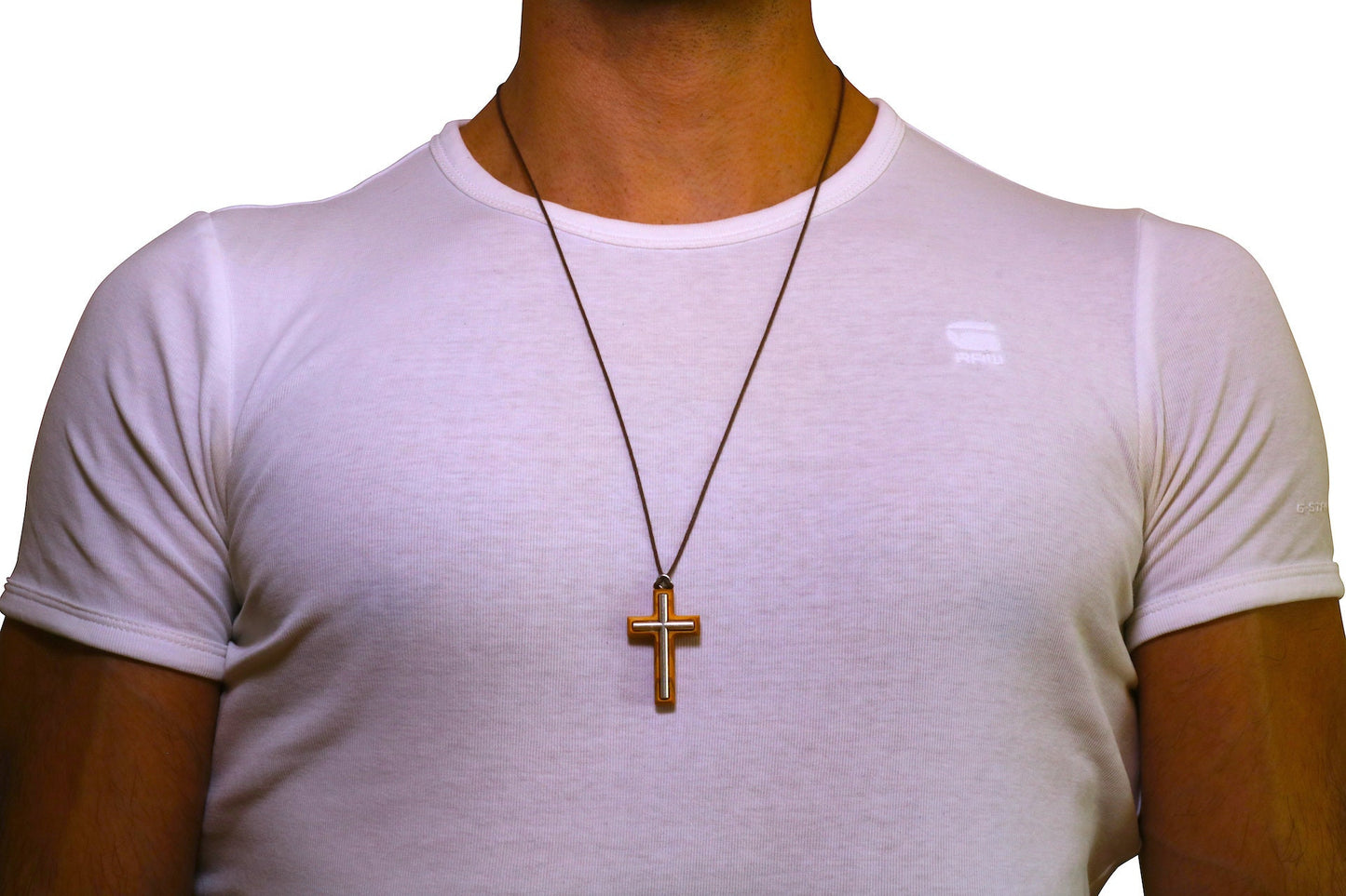Metal cross olive wood necklace worn by man