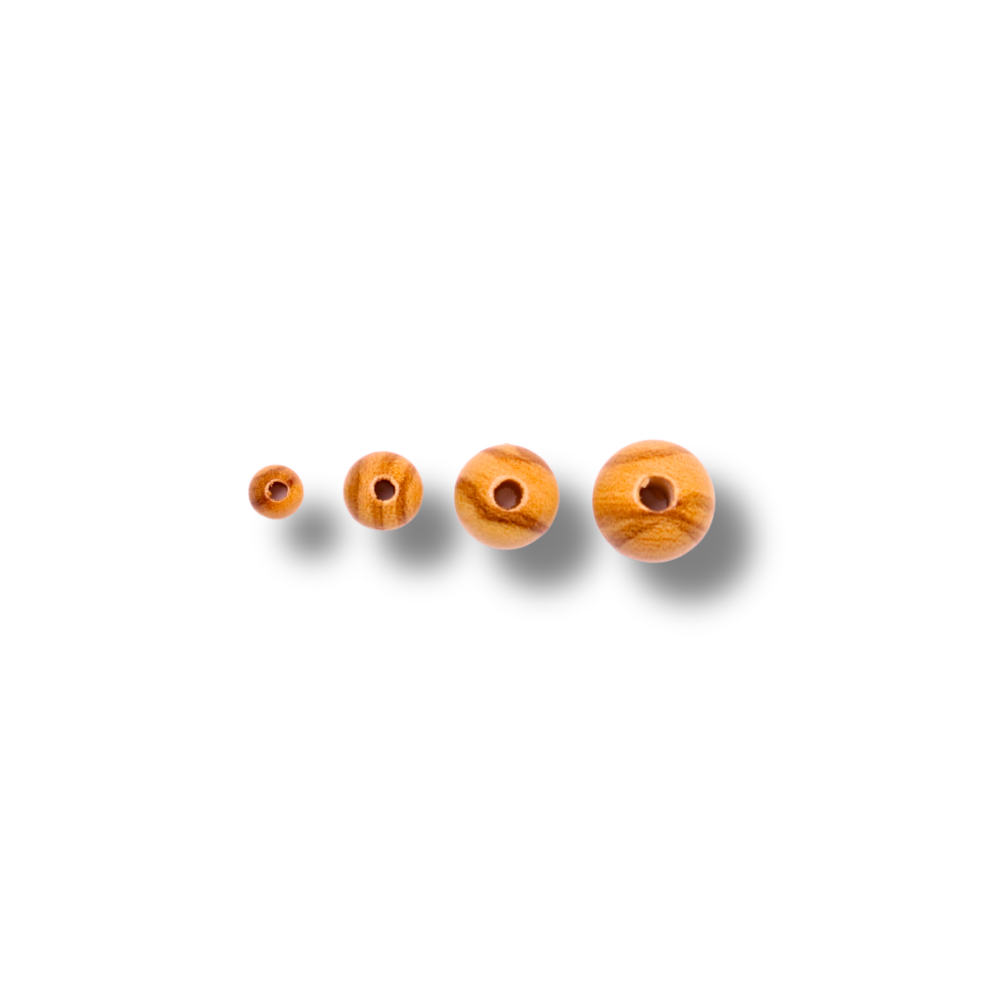 Four wooden beads of different sizes on a white background
