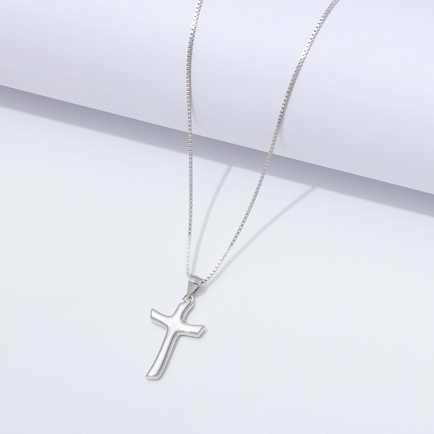 925 Sterling Silver Flow Cross Necklace On a White Background