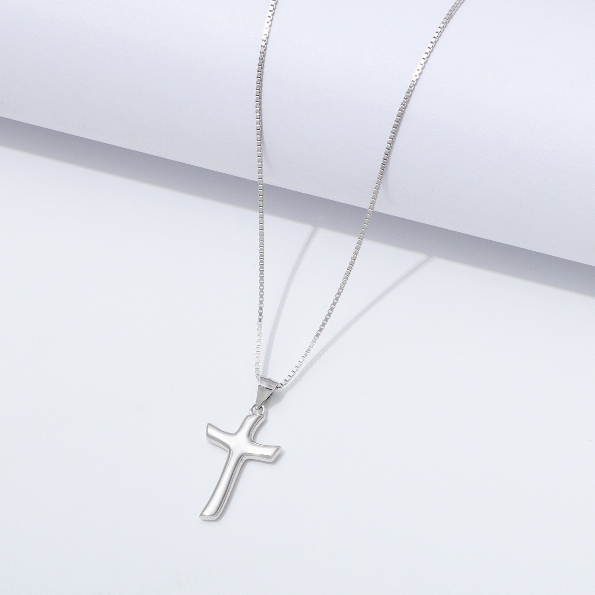 925 Sterling Silver Flow Cross Necklace On a White Background
