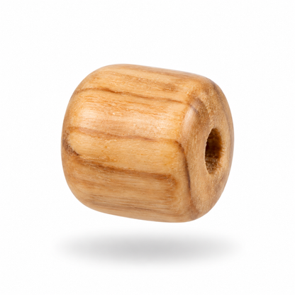 A single cylindrical wooden bead with a smooth, polished finish and visible natural wood grain, shown floating against a solid white background with a soft shadow underneath.