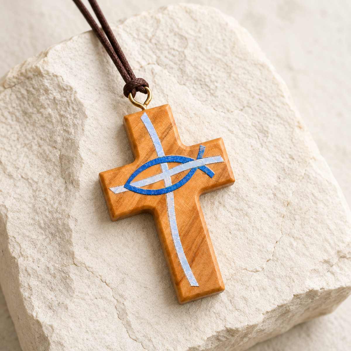 Detail view of Blue Ichthus Olive Wood Cross Necklace