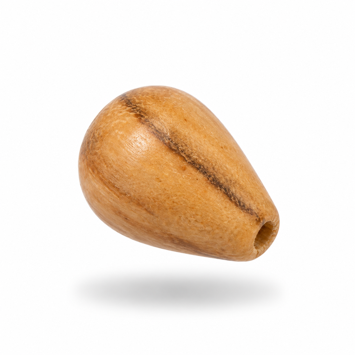 A single teardrop-shaped wooden bead with a natural wood grain finish and a dark center stripe, shown floating against a solid white background with a soft drop shadow.