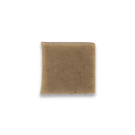 Square piece of a soap bar on a white background