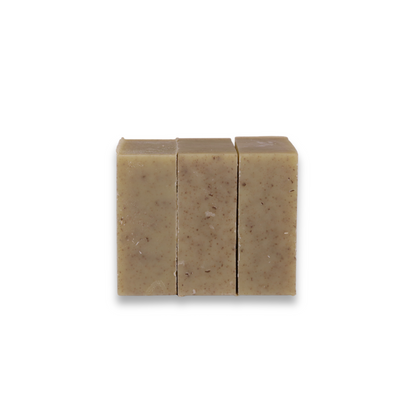 Three rectangular soap bars on a white background