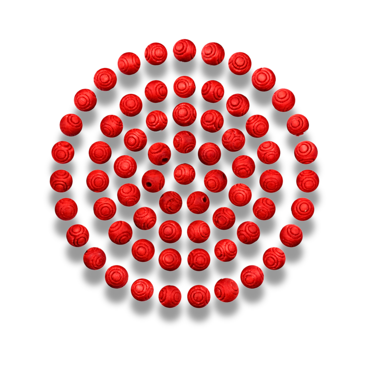 Red rose-shaped beads arranged in a circular pattern on a white background