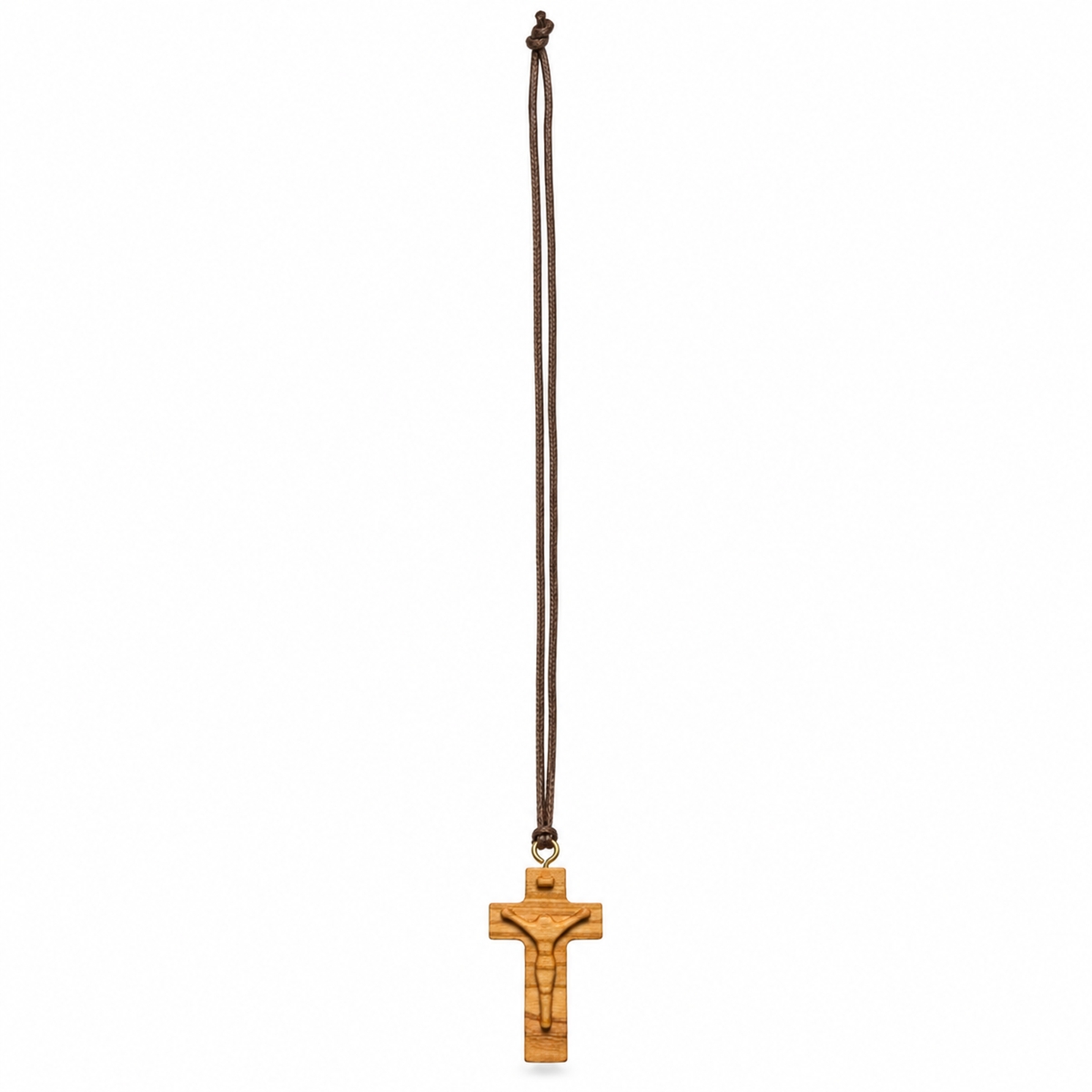A wooden crucifix pendant with an engraved figure of Jesus Christ, hanging from a dark brown cord on a plain white background.