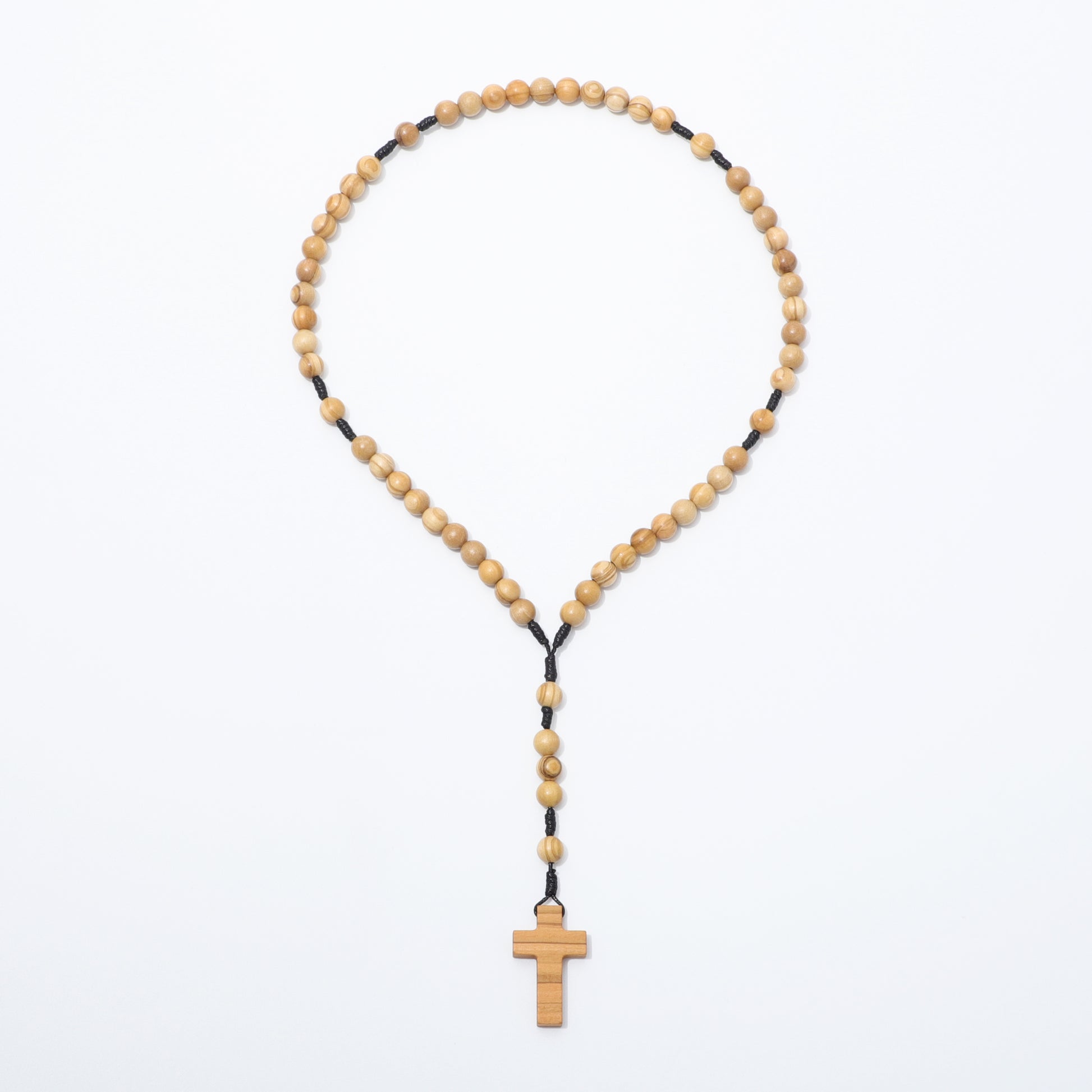 Olive wood rosary with a cross pendant on a white background