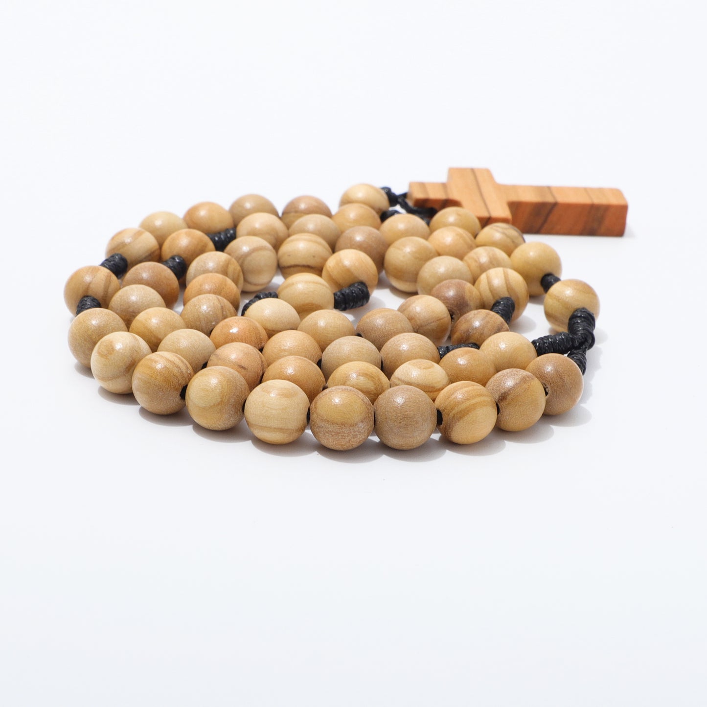 Olive wood rosary with a cross pendant on a white background