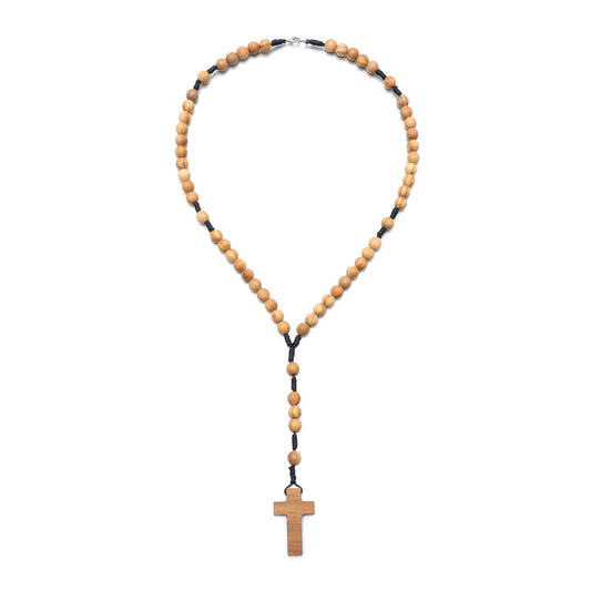 Wooden rosary necklace with a cross pendant on a white background