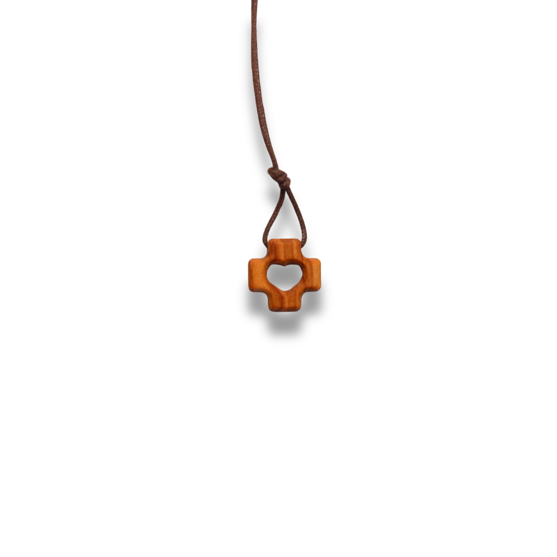 Necklace with a wooden pendant shaped like a heart on a white background