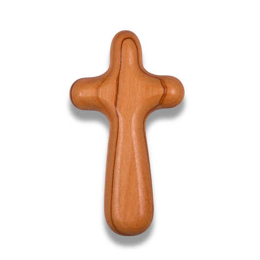 Olive wood holding cross on a white background