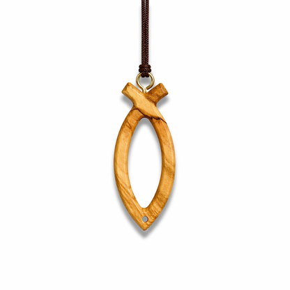 Olive wood fish-shaped pendant on a white background