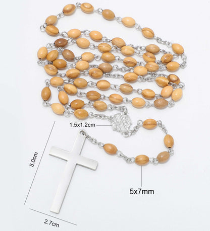 A rosary necklace with light brown wooden beads and a silver-tone cross pendant, shown on a white background with overlaid dimension labels and measurements.