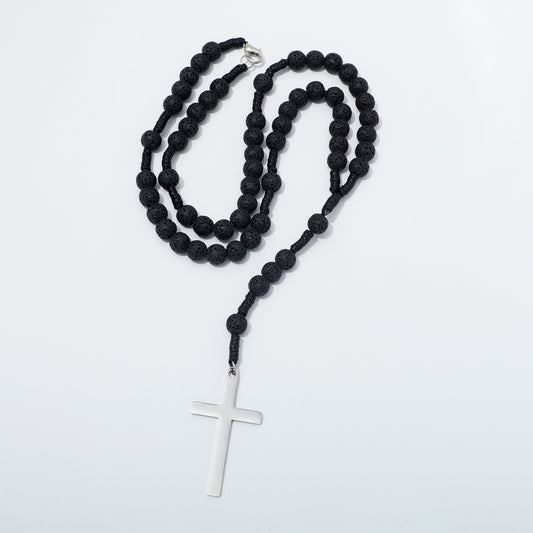 Lava stone rosary necklace arranged in loops with the clasp visible