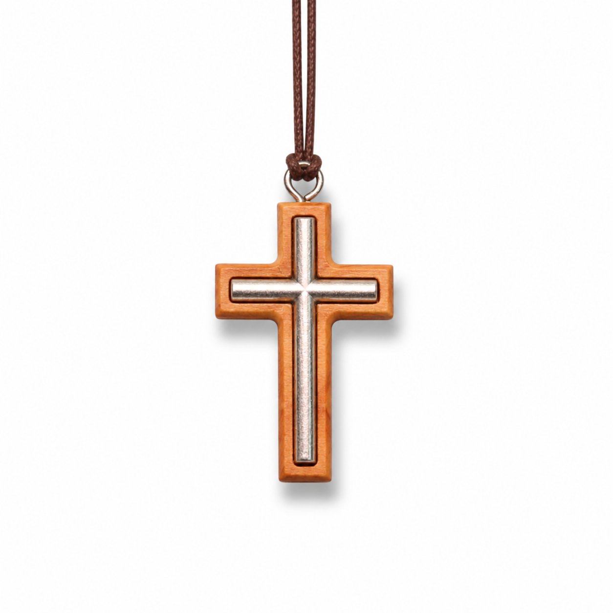Wooden cross pendant with a brown cord on a white background