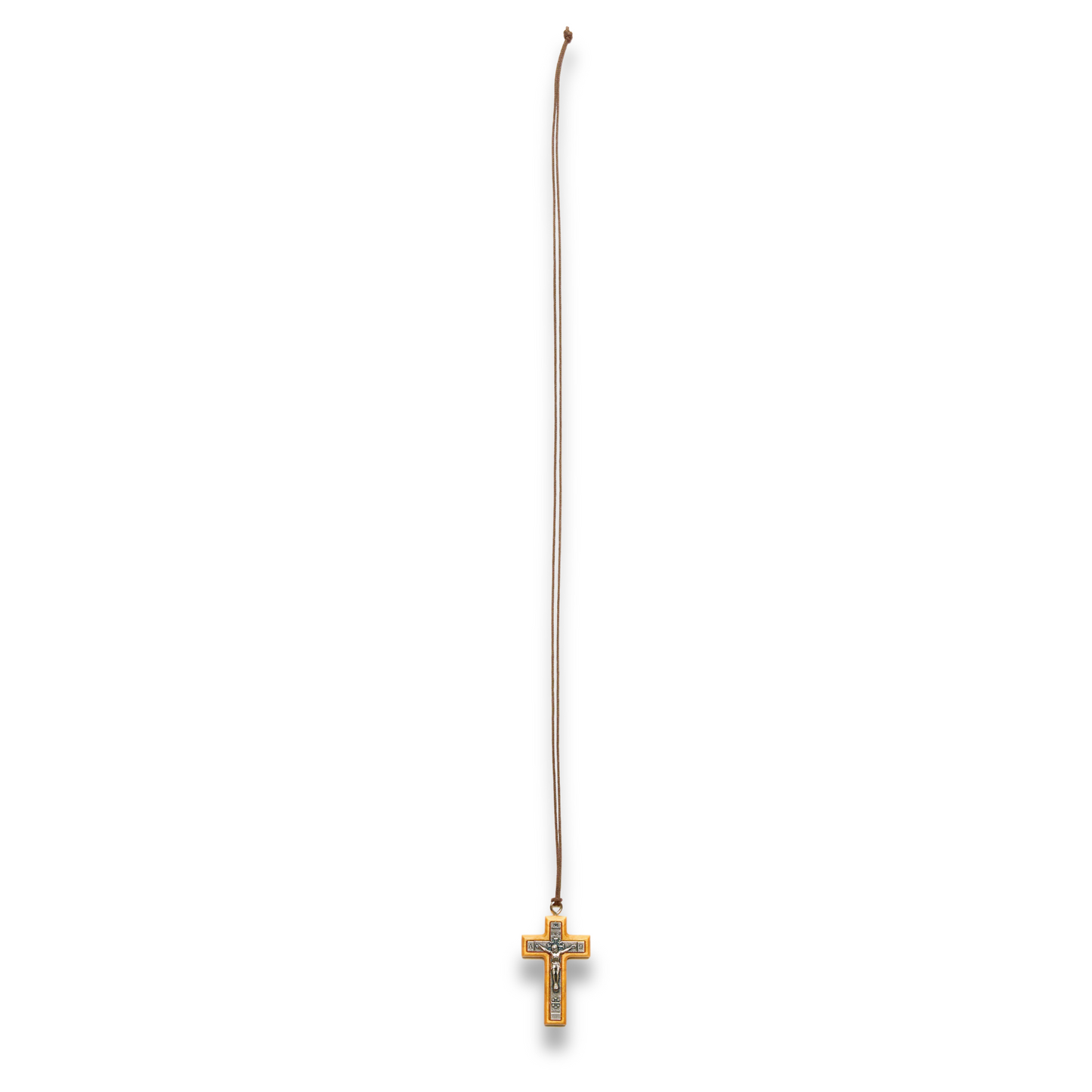 Crucifix necklace on a white background