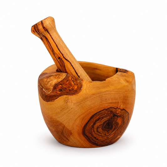 Wooden mortar and pestle on a white background
