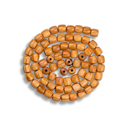 String of wooden beads on a white background