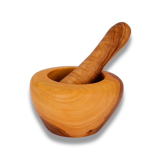 Wooden mortar and pestle on a white background