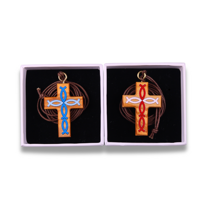 Two Olive wood cross pendants with blue and red fish symbols in gift boxes