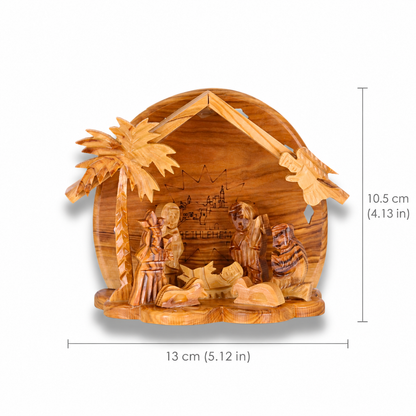 Hand-carved olive wood nativity scene with a thatched-roof stable, palm tree, and small wooden figures With Measurements