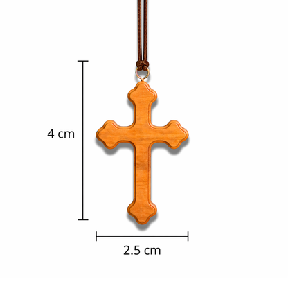 Wooden cross pendant with dimensions on a white background