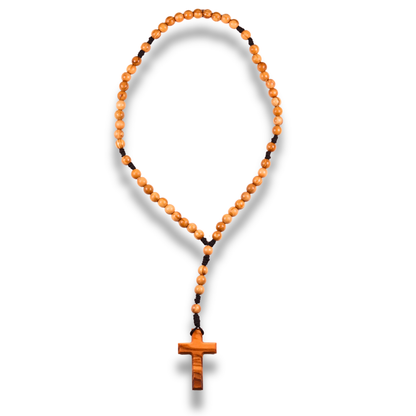 Olive wood rosary and a cross on a white background